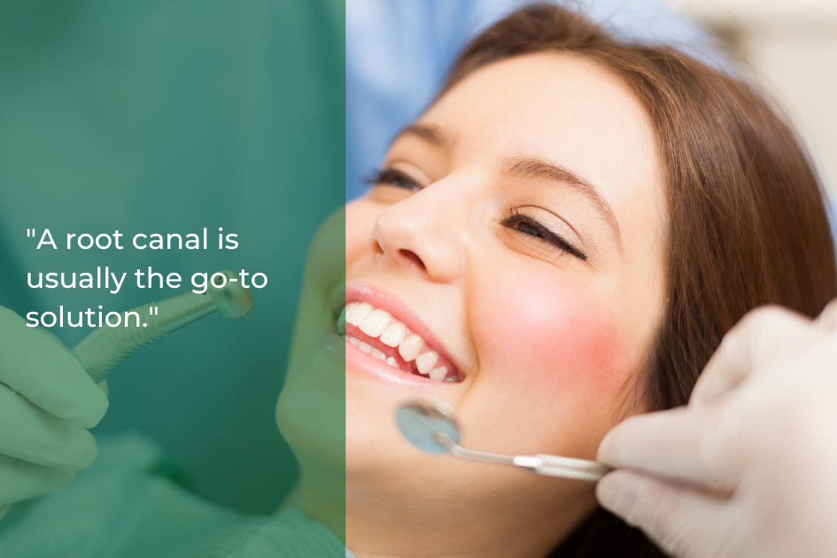 A smiling person at a dental appointment with a dental mirror and tool near their mouth. Text reads, &quot;A root canal is usually the go-to dental procedure.