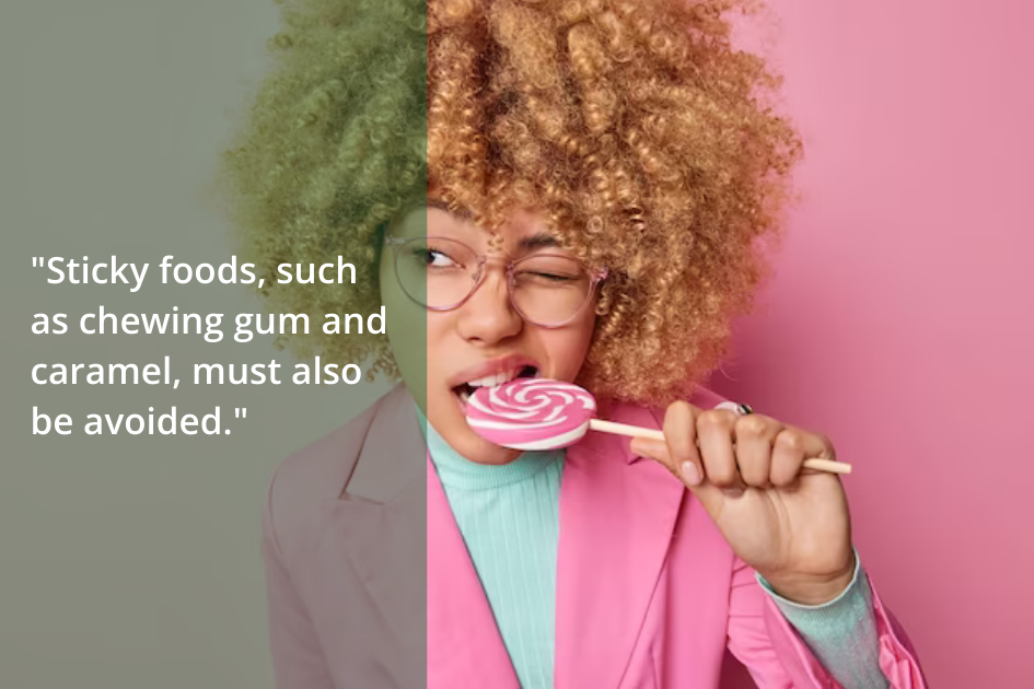 Person with curly hair and glasses holding a large lollipop to their mouth, winking at the camera. Text overlay reads, &quot;Sticky foods, such as chewing gum and caramel, must also be avoided when following an Invisalign diet.